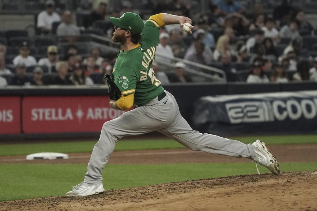 Oakland Athletics' Paul Blackburn pitches in the fourth inning of a baseball game against the New York Yankees, Monday, June 27, 2022, in New York. (AP Photo/Bebeto Matthews)