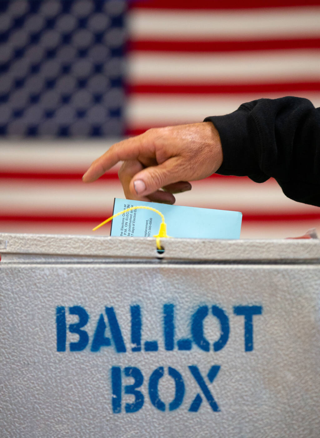 Bryan Asch of Santa Rosa personally places his mail-in ballot into a ballot box at the Sonoma County Fairgrounds on Election Day in Santa Rosa, California, on Tuesday, Nov. 3, 2020. (Alvin A.H. Jornada / The Press Democrat)