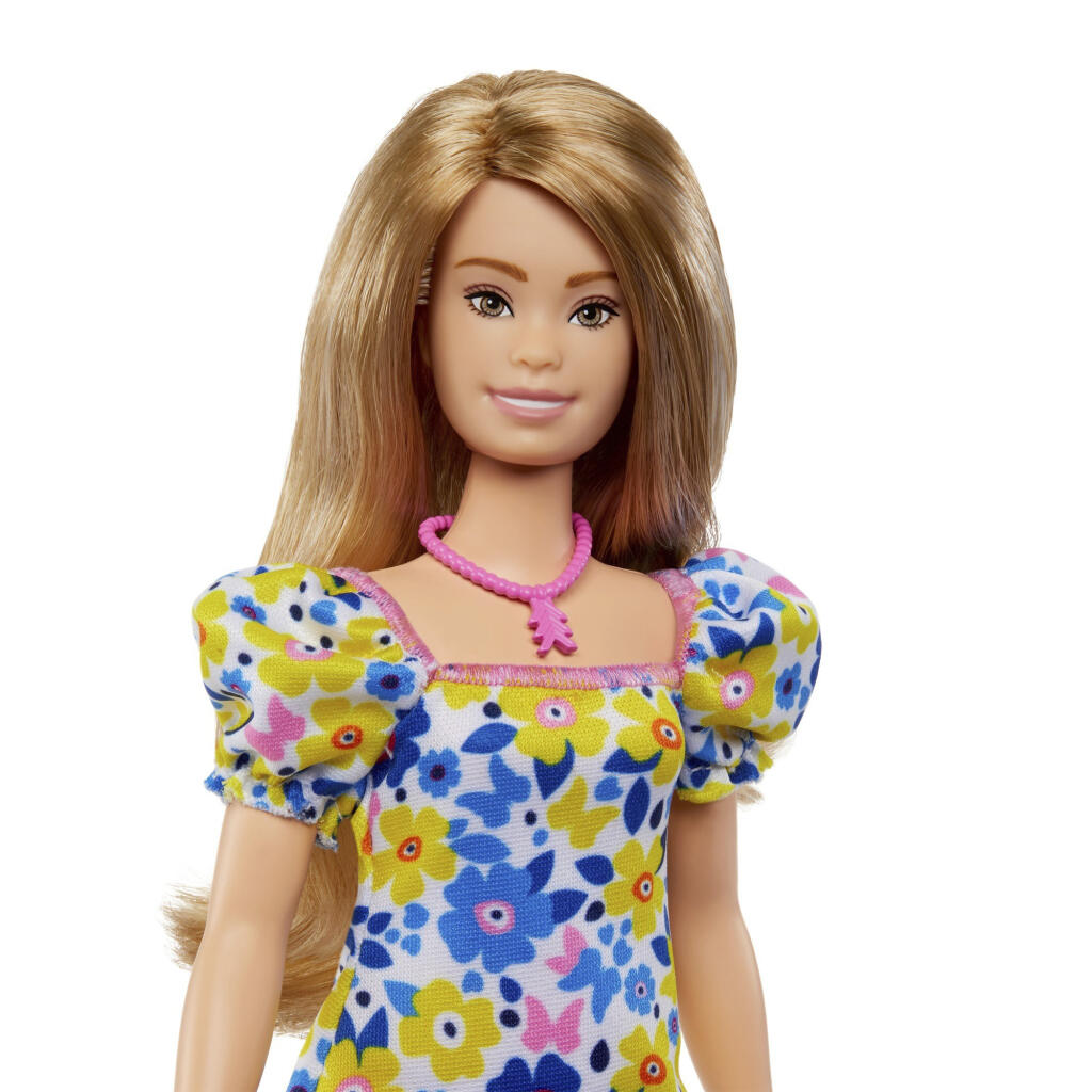 This image provided by Mattel, Inc., Tuesday, April 25, 2023, shows its first Barbie doll representing a person with Down syndrome. Mattel collaborated with the National Down Syndrome Society to create the Barbie and "ensure the doll accurately represents a person with Down syndrome," the company said. (Mattel, Inc. via AP)