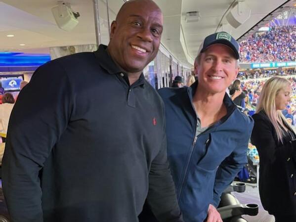 Earvin "Magic" Johnson and California Gov. Gavin Newsom pose together at the NFC championship game between the San Francisco 49ers and the Los Angeles Rams in Inglewood on Sunday, Jan. 30, 2022. (@MagicJohnson / Twitter)