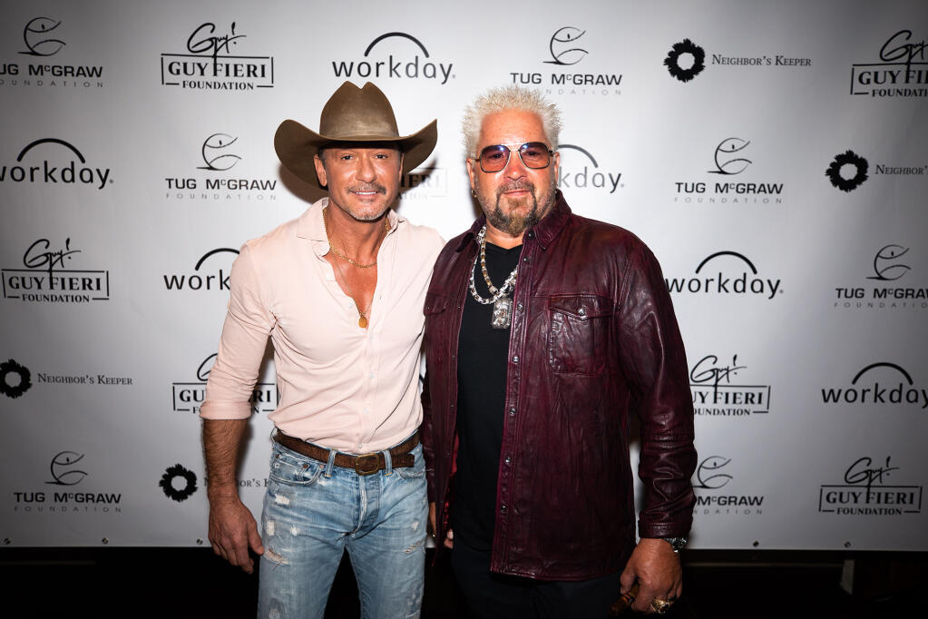 Tim McGraw and Guy Fieri at Wine Country Weekend, held Oct. 21 and Oct. 22, 2022, in the Napa Valley. (Tyler Conrad)