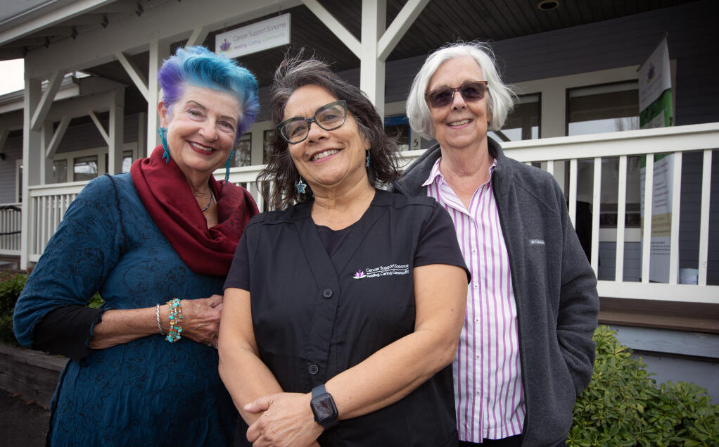 From left, Bonnie Joy Kaslan, client and volunteer, Teri Adolfo, executive director, and Janet Engelbrecht, volunteer, in front of Cancer Support Sonoma’s new location on First Street West on Thursday, March 28, 2024. (Robbi Pengelly/Index-Tribune)