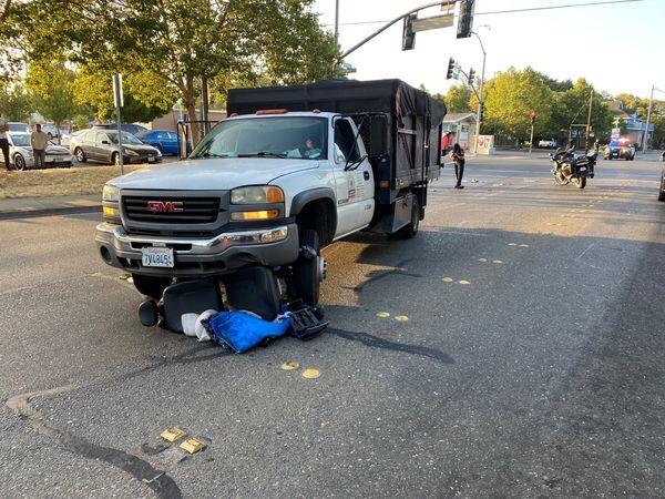 A GMC truck driver hit and dragged a motorized wheelchair user for 60 feet on Dutton Avenue in Santa Rosa on Tuesday, July 20, 2021. (Santa Rosa Police Department / Facebook)