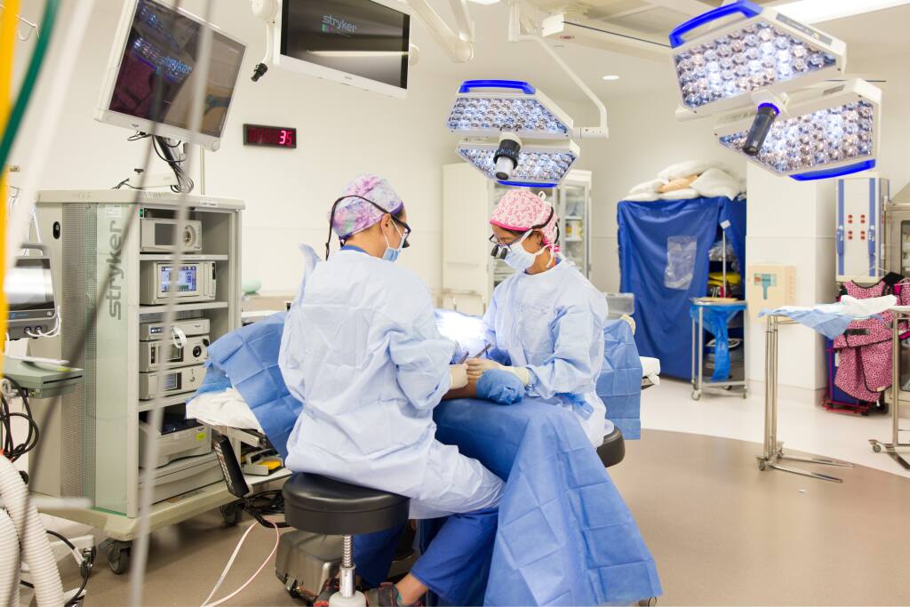 Medical personnel in an operating room at MarinHealth hospital in Greenbrae, Marin County. (Chris Constantine photo) 2020
