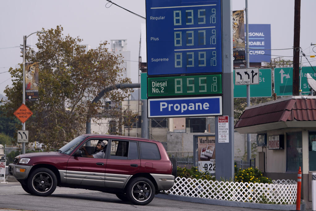 As gas prices top $8 a gallon at some stations in Los Angeles, Gov. Gavin Newsom is promising a windfall profits tax proposal targeting oil companies. (MARCIO JOSE SANCHEZ / Associated Press)