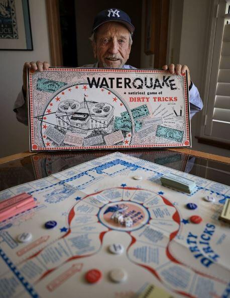 Kenneth Fox at his Santa Rosa home, June 22, 2022 and the board game he created as a result of the Watergate scandal, back in the 1970s. (The Press Democrat)
