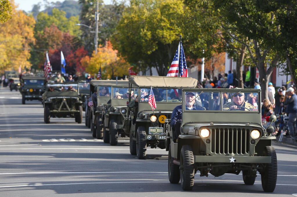 2nd Infantry Division Jeeps drive in the Veterans Day Parade in Petaluma, Friday, Nov. 11, 2022. (Christopher Chung / The Press Democrat file)