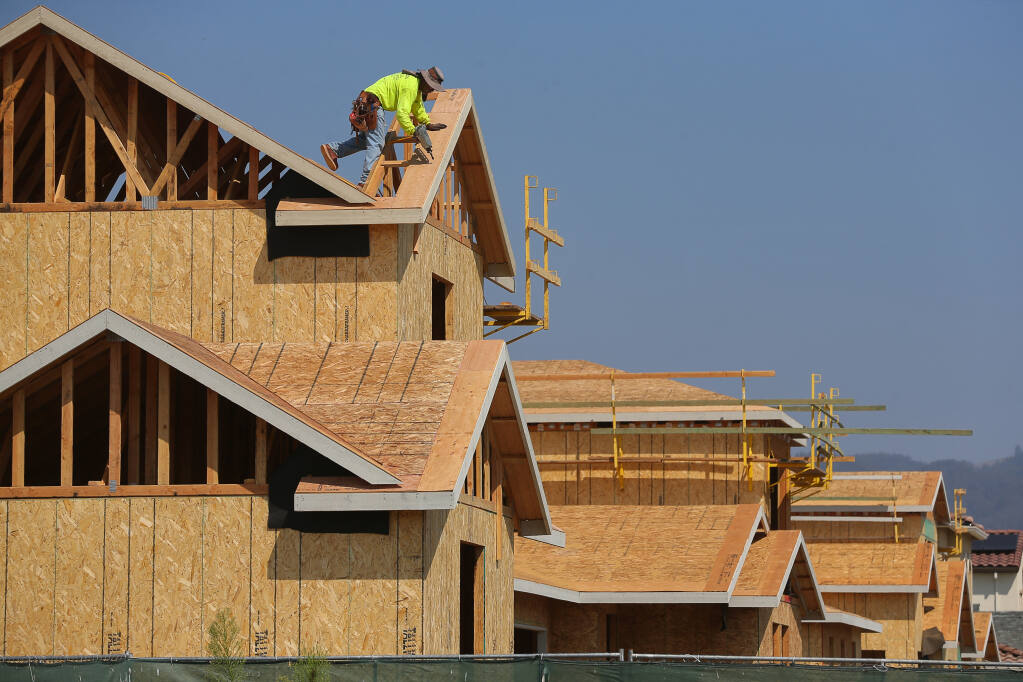 Single family homes under construction along Kassandra Place, at Kingwood Road, in Rohnert Park on Thursday, Sept. 2, 2021.  (Christopher Chung / The Press Democrat)