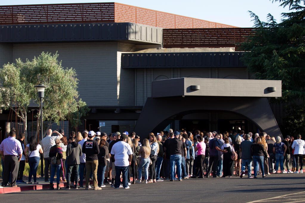 People going to see the Dave Chappelle show lineup outside the Luther Burbank Center for the Arts, Tuesday, July 26, 2022, in Santa Rosa. (Darryl Bush / For The Press Democrat)