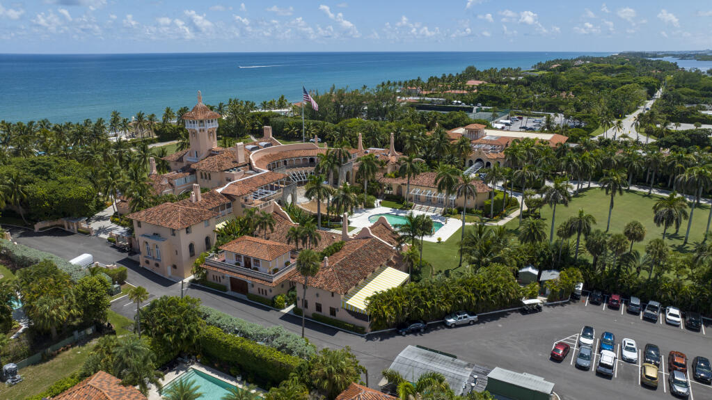 FILE - Former President Donald Trump's Mar-a-Lago club is seen in the aerial view in Palm Beach, Fla., Aug. 31, 2022. A federal appeals court has halted an independent review of documents seized from the estate, removing a hurdle the Justice Department said had delayed its criminal investigation into the retention of top secret government information. (AP Photo/Steve Helber, File)