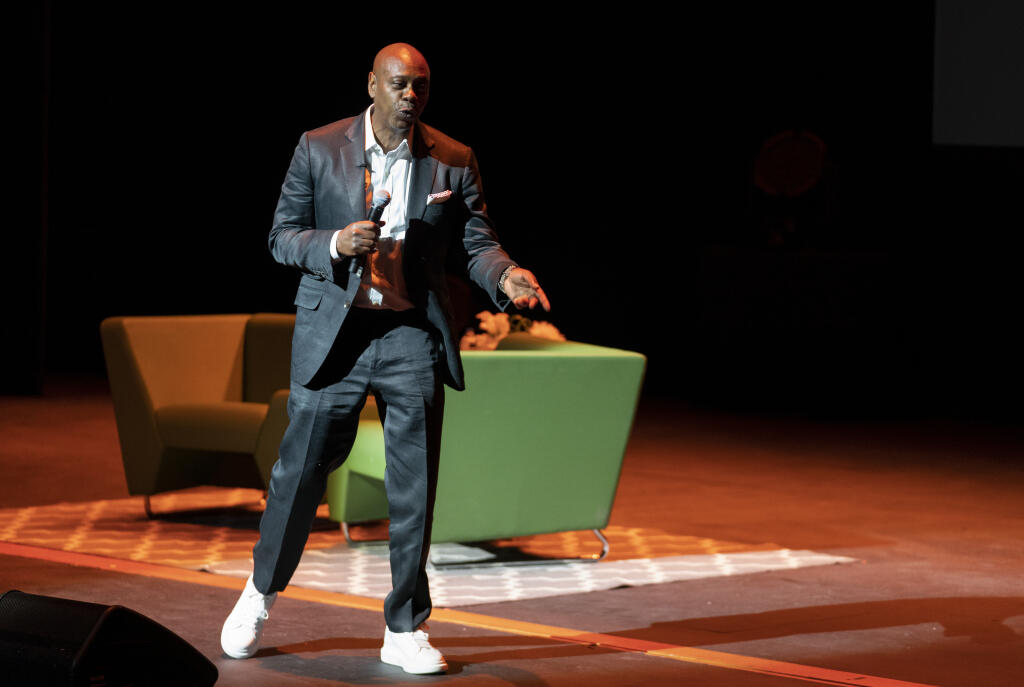 Dave Chappelle performs during a theater dedication ceremony honoring the comedian and actor, and to raise funds to support Duke Ellington School of the Arts in Washington, Monday, June 20, 2022. (AP Photo/Gemunu Amarasinghe)