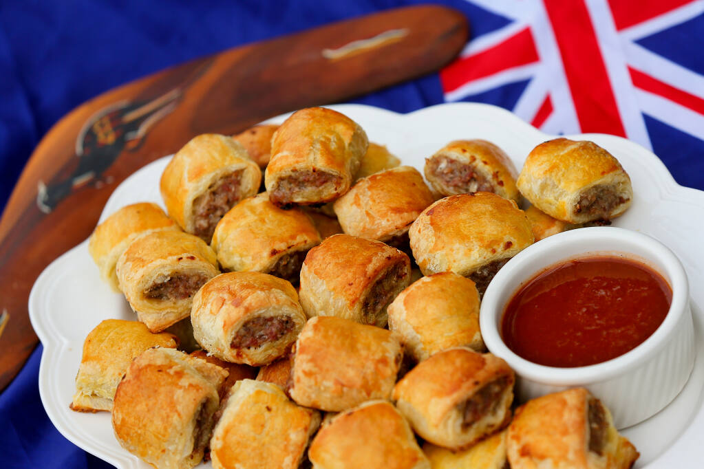 Australian sausage rolls with homemade tomato sauce (ketchup) made by Daryl and Lisa Groom. The sausage rolls provide them with a taste of their homeland. (Christopher Chung/ The Press Democrat)