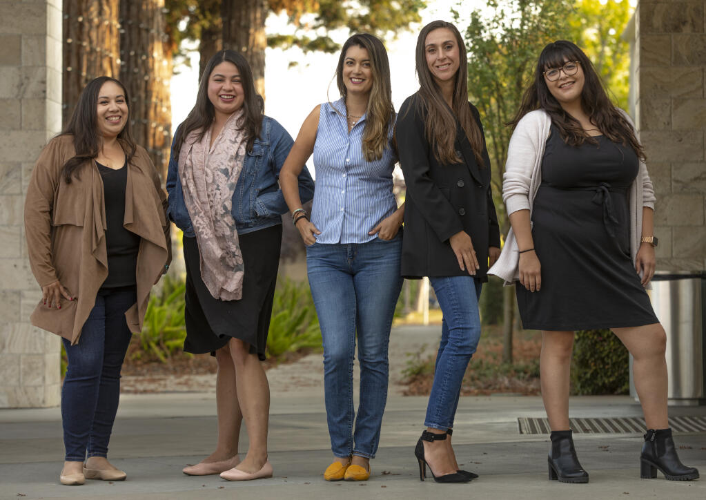 Board Members of the Hispanic Chamber of Commerce include, from left,  Chamber President Alma Magallon, Dora Estrada, Sandra Gutierrez, Leticia Romo and Vice President Jackie Gonzalez Wednesday September 14, 2022 outside their offices on Cleveland Ave in Santa Rosa. (Chad Surmick / The Press Democrat)