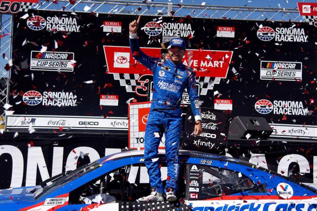 Kyle Larson celebrates in Victory Lane after winning the NASCAR Cup Series Toyota/Save Mart 350 at Sonoma Raceway in 2021. The Northern California native is one of the top contender’s in this year’s race. (Alvin A.H. Jornada / For The Press Democrat)