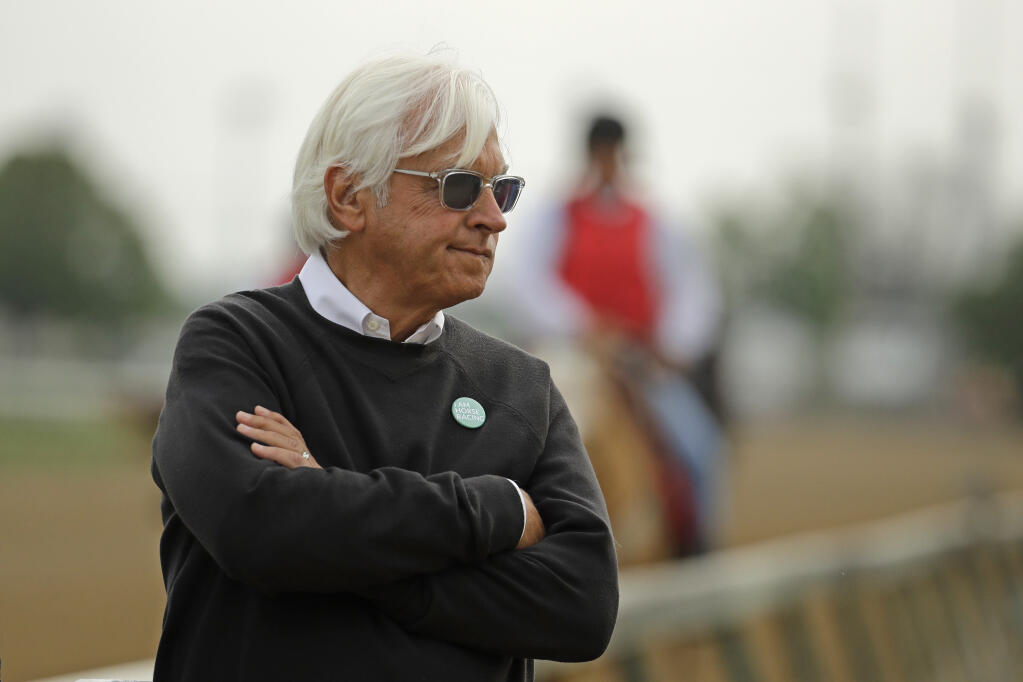 FILE - In this May 1, 2019, file photo, trainer Bob Baffert watches his Kentucky Derby entrant Game Winner during a workout at Churchill Downs in Louisville, Ky. Baffert’s lawyer said Wednesday, June 2, 2021, that a split-sample test of Kentucky Derby winner Medina Spirit came back positive for the presence of the steroid betamethasone, which could lead to the horse’s disqualification and discipline for the Hall of Fame trainer.  (AP Photo/Charlie Riedel, File)