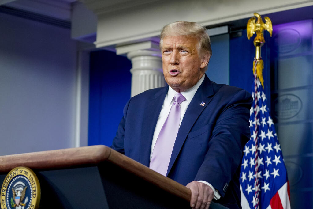 President Donald Trump speaks at a news conference in the James Brady Press Briefing Room at the White House, Tuesday, Aug. 11, 2020, in Washington. (AP Photo/Andrew Harnik)
