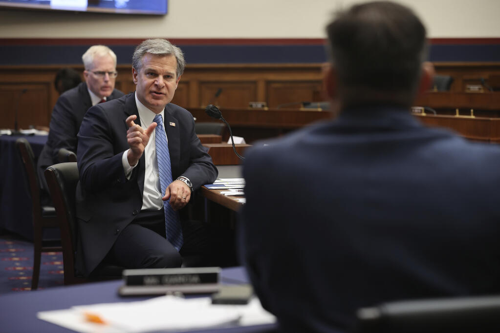 FBI Director Christopher Wray testifies before a House Committee on Homeland Security hearing Thursday, Sept. 17, 2020, on Capitol Hill Washington. (Chip Somodevilla/Pool via AP)