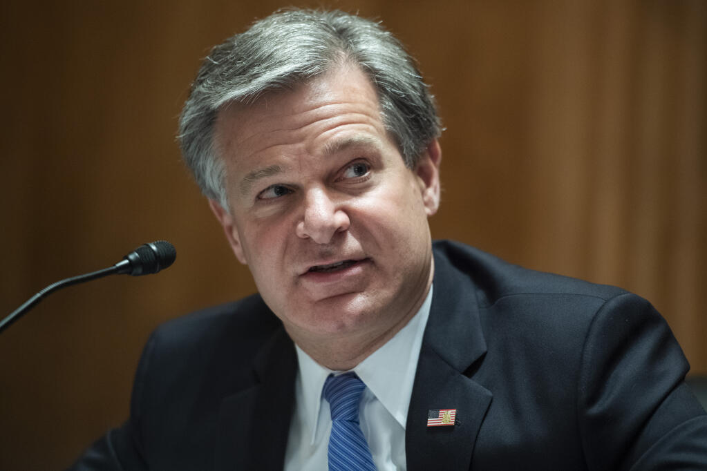 FBI Director Christopher Wray testifies before a Senate committee on Sept. 24, 2020. (TOM WILLIAMS / CQ Roll Call)