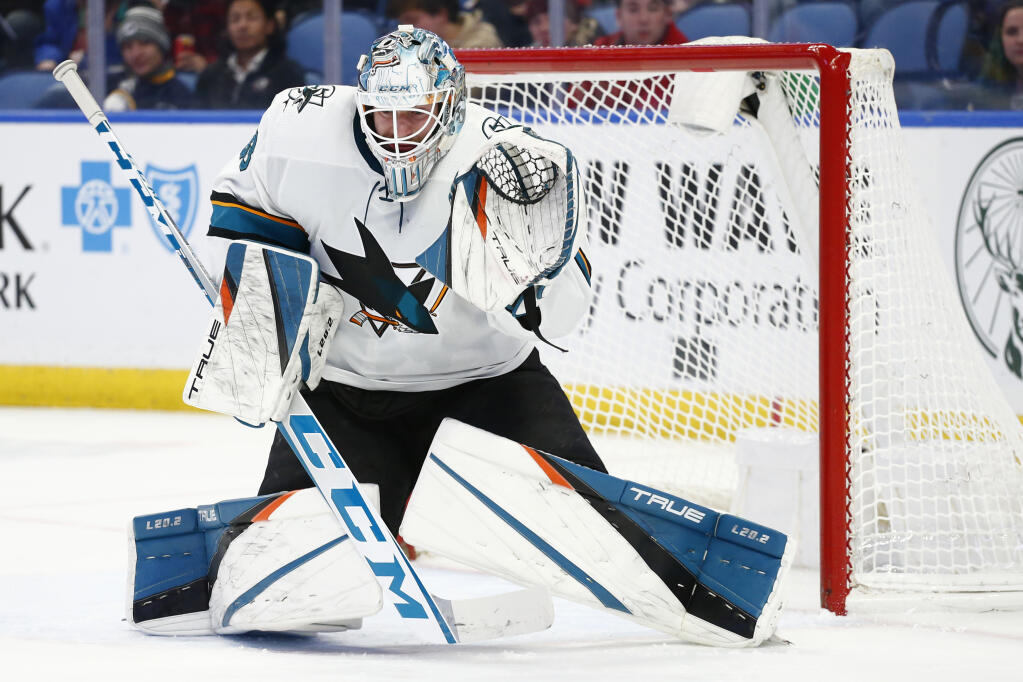 San Jose Sharks goaltender Adin Hill makes a save during the first period against the Sabres on Thursday, Jan. 6, 2022, in Buffalo, New York. (Jeffrey T. Barnes / ASSOCIATED PRESS)