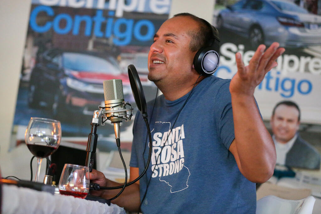 “Sonoma Confidencial” podcast host Juan Carlos Arenas records a show at his home studio in Santa Rosa on Wednesday, June 16, 2021.  (Christopher Chung/ The Press Democrat)