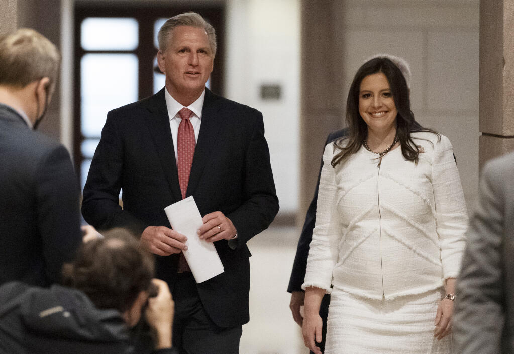 House Minority Leader Kevin McCarthy of Calif., left, and Rep. Elise Stefanik, R-N.Y., walk to speak with reporters on Capitol Hill Friday, May 14, 2021, in Washington. Republicans have vaulted Rep. Elise Stefanik into the ranks of House leadership. The upstate New York Republican was elected to the party's No. 3 post on Friday.   (AP Photo/Alex Brandon)