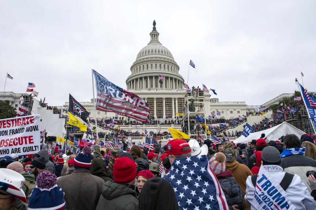 FILE - Rioters loyal to President Donald Trump rally at the U.S. Capitol in Washington on Jan. 6, 2021. The House committee investigating the Jan. 6 attack on the U.S. Capitol is expected to interview former Secret Service agent Tony Ornato on Tuesday about Donald Trump’s actions on the day of the insurrection. (AP Photo/Jose Luis Magana, File)
