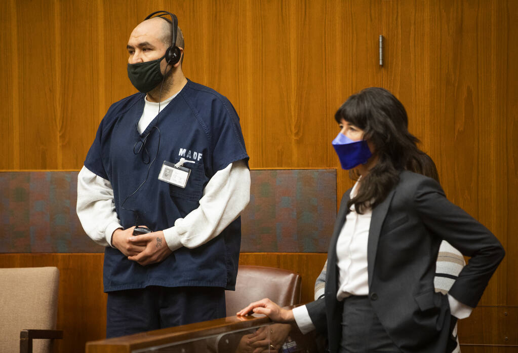 Gerardo Mendoza Ordaz appears in a Sonoma County courtroom with Public Defender Sarah Grenfell on Wednesday, Oct. 20, 2021, where he was sentenced to 11 years in prison for drowning his 4-year-old daughter, Maria, in a church baptismal pool. (John Burgess / The Press Democrat)