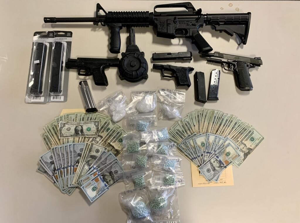Investigators seized high-capacity firearm magazines for sale, 2.5 ounces of suspected methamphetamine, 1 ounce of psilocybin mushrooms, hundreds of fentanyl pills meant to look like oxycodone and more than $2,000 in cash in connection with a monthslong investigation into drug and firearms trafficking, Santa Rosa police said. (Courtesy Santa Rosa Police Department)