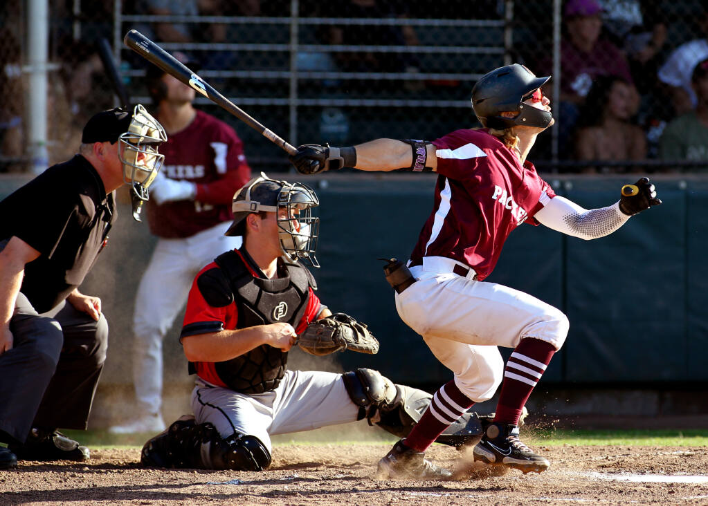 Healdsburg Prune Packers' Jake Holcroft watches a hit during the first inning against the Walnut Creek Crawdads in CCL baseball, on Tuesday, August 2, 2022, in Healdsburg. (Darryl Bush / For The Press Democrat)