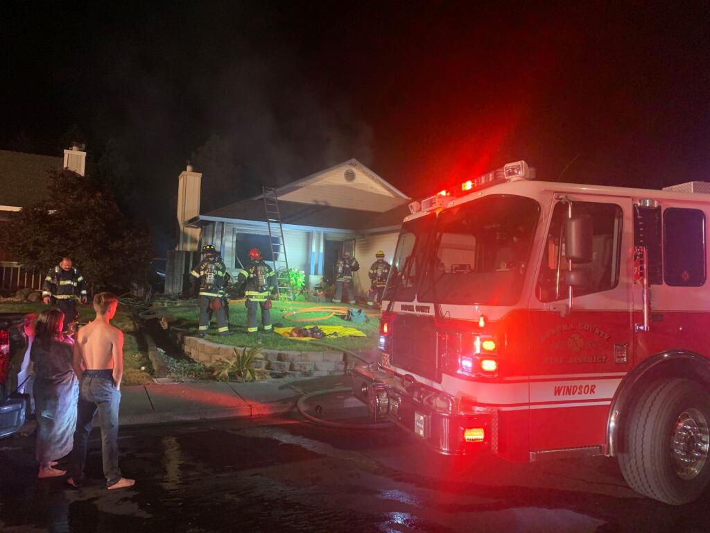 Emergency crews at the scene of a house fire on Dove Lane in Windsor, Friday, May 28, 2021. (Sonoma County Fire District / Facebook)