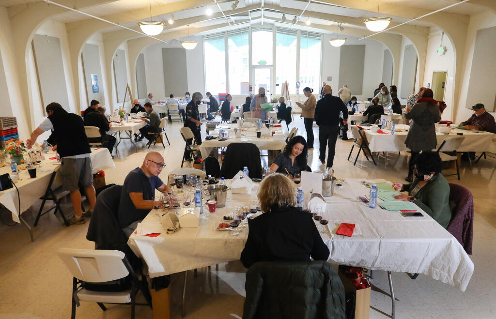 Judging continues at the North Coast Wine Challenge, held at the Sonoma County Fairgrounds, in Santa Rosa on Tuesday, April 6, 2021.  (Christopher Chung/ The Press Democrat)