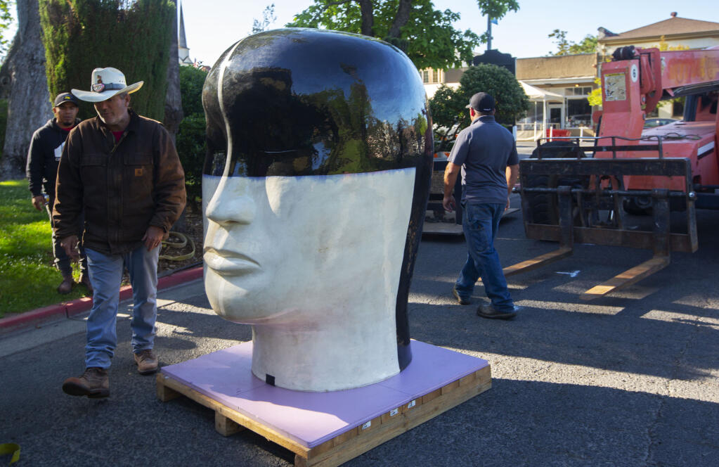 One of Jun Kaneko’s oversized ceramic heads, which will be displayed at the front of the Plaza until October 19. (Photo by Robbi Pengelly/Index-Tribune)
