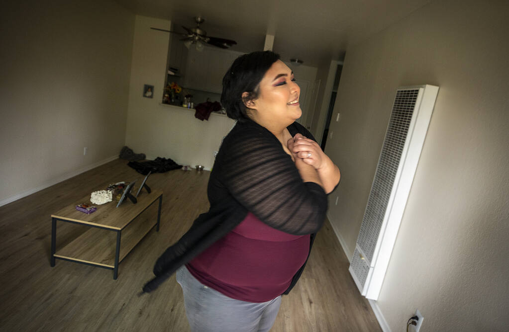 Aria Bonifacio, 23, moved out of her parents' house in Solano County because of conflict over her gender identity and into a Rohnert Park apartment of her own two weeks ago. Several local agencies are participating in the 100 Day Challenge to  house 65 "transitional age youth" with particular emphasis on people of color and LGBTQ+ youth. (John Burgess / The Press Democrat)
