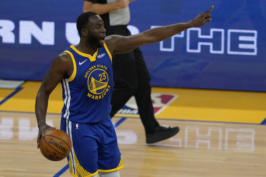 Golden State Warriors forward Draymond Green (23) against the Cleveland Cavaliers during an NBA basketball game in San Francisco, Monday, Feb. 15, 2021. (AP Photo/Jeff Chiu)
