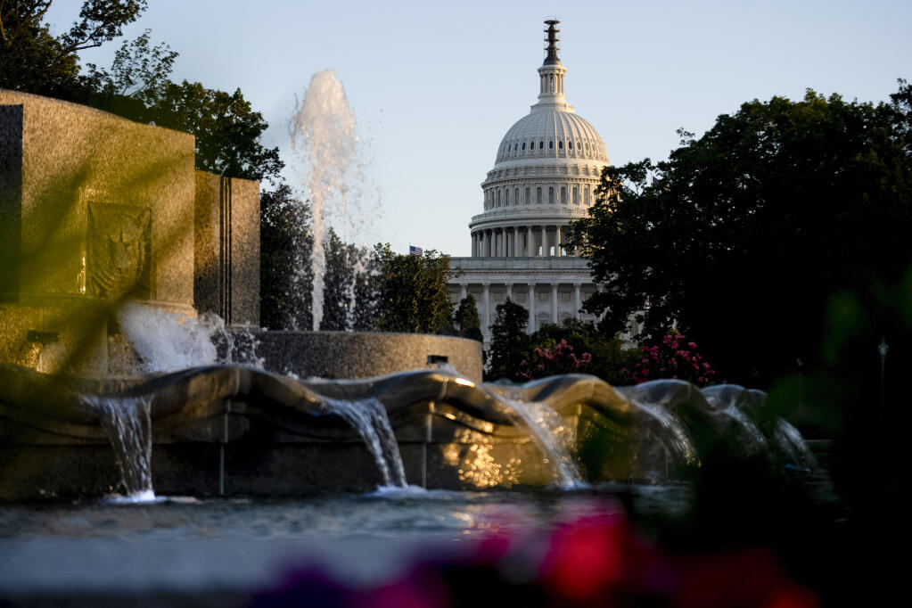 The Dome of the U.S. Capitol Building at sunset seen from Upper Senate Park in Washington, Wednesday, Sept. 27, 2023. (AP Photo/Andrew Harnik)