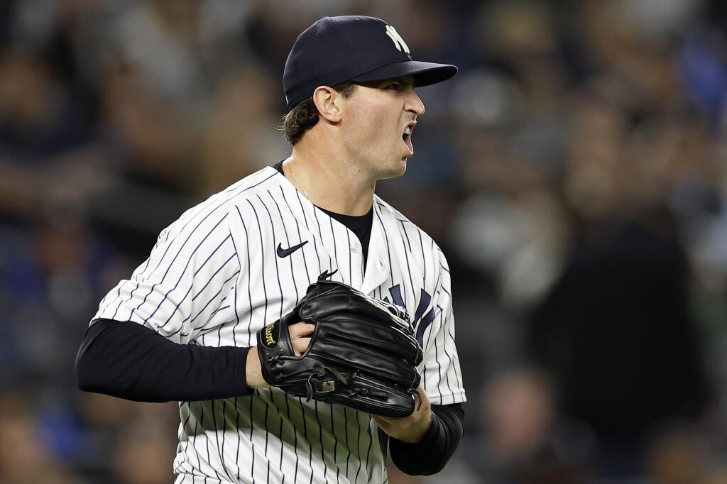 New York Yankees pitcher Zack Britton reacts during the sixth inning of the team's baseball game against the Baltimore Orioles on Friday, Sept. 30, 2022, in New York. (AP Photo/Adam Hunger)