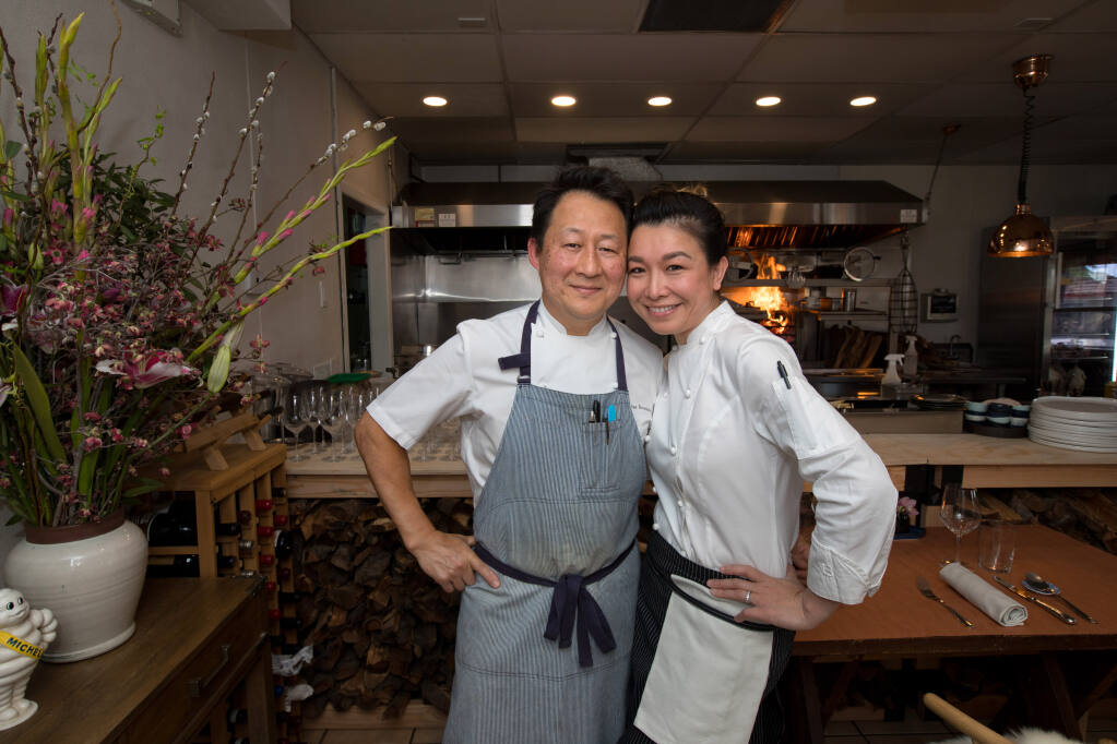 Owners Joshua Smookler and Heidy He pose inside their restaurant, Animo, in Sonoma in March 2022. (Darryl Bush / For The Press Democrat file)