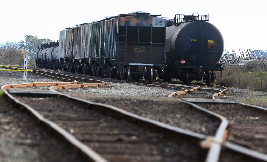 Oil tankers are stored along a rail line south of Highway 12, near Eighth Street East, in Schellville on Friday, Jan. 14, 2022. (Christopher Chung/ The Press Democrat)