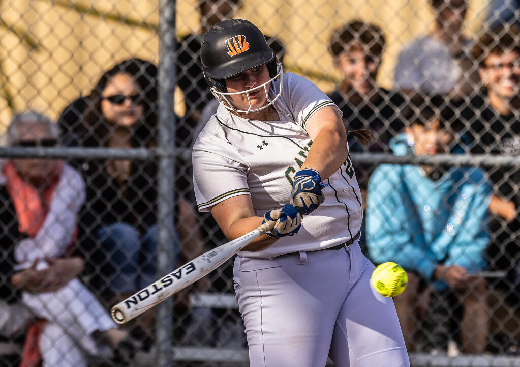 Casa Grande's Lily Partridge hammers a home run in a 5-0 win over Alameda High in the North Coast Section semifinal playoffs Tuesday, May 23, 2023, in Petaluma. (John Burgess/The Press Democrat)