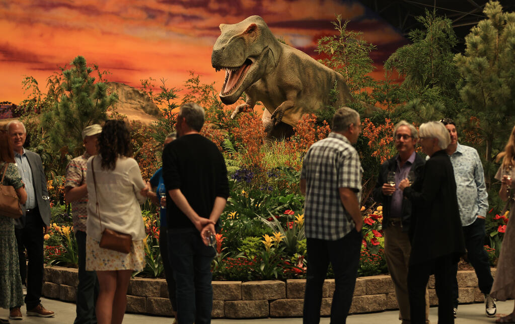 As a preview prior to opening day to the Hall of Flowers and the Sonoma County Fair, people paid $50 a piece to cruise the annual botanical displays and this year’s theme of “Dinosaurs Around the World,” in Santa Rosa, Wednesday, Aug. 2, 2023. (Kent Porter / The Press Democrat)