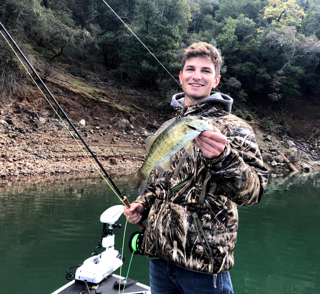 Ben Mallett of Sonoma shows one of many smallmouth bass he landed recently fishing with Capt. Patrick MacKenzie on Lake Sonoma. (Patrick MacKenzie photo)