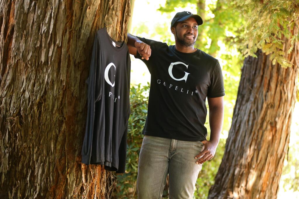 Andrew Akufo and business partner Toja Hodge have launched the fashion line Gapelii Brand, which is an acronym for Growth, Ambition, Prosperity, Elevate, Lifestyle, Innovation and Influence.(Christopher Chung / The Press Democrat)