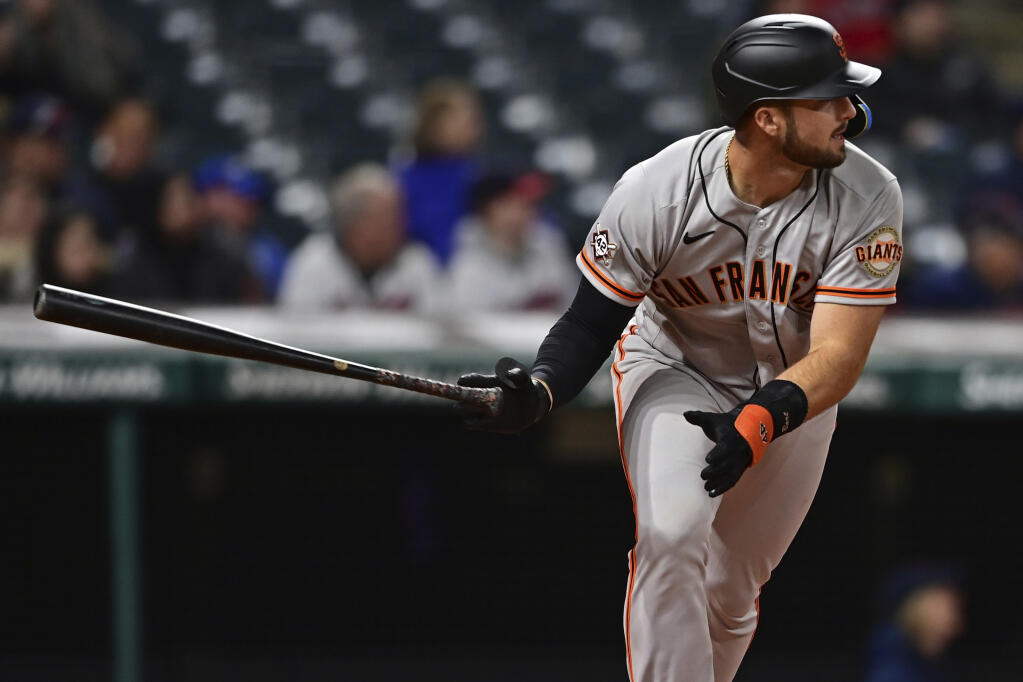 San Francisco Giants' Joey Bart watches his two-run home run off Cleveland Guardians relief pitcher Anthony Castro in the eighth inning of a baseball game, Friday, April 15, 2022, in Cleveland. (AP Photo/David Dermer)