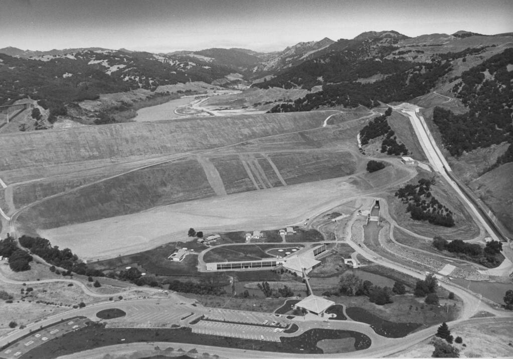 A 1983 view of Warm Springs Dam, which was one of California’s last large-scale water storage projects. The fish hatchery and visitor’s center are in the foreground. (Press Democrat file)