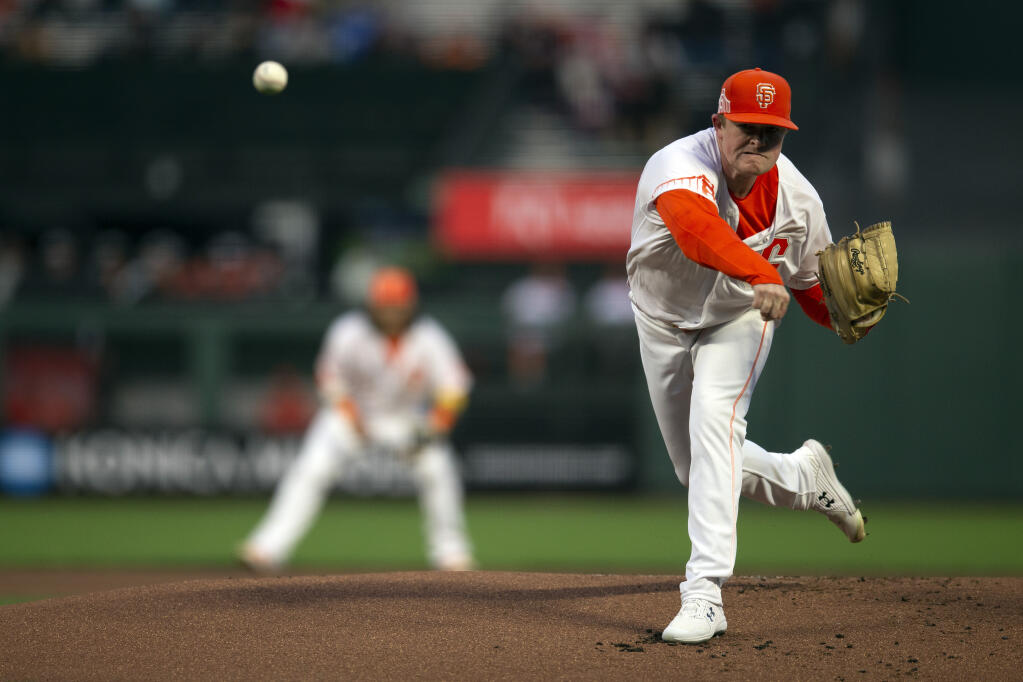San Francisco Giants starting pitcher Logan Webb delivers a pitch against the Arizona Diamondbacks during the first inning on Tuesday, Sept. 28, 2021, in San Francisco. (D. Ross Cameron / ASSOCIATED PRESS)
