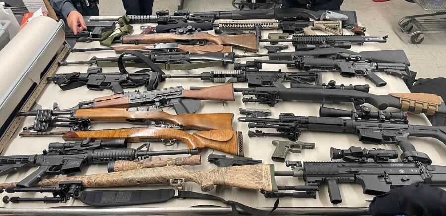 San Jose police officers found 40 guns and 10,000 rounds of ammunition in a man's home as part of a search warrant related to a road rage incident, officials said in a Thursday news release. (San Jose Police Department, Media Relations Unit)