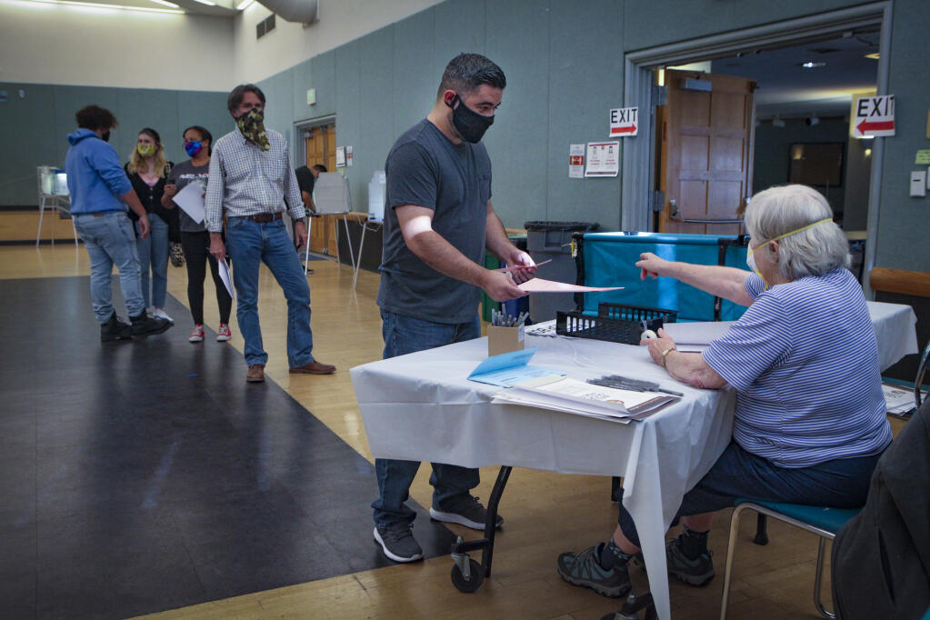 Petaluma, CA, USA, Tuesday, November 03, 2020._A steady flow of Sonoma County voters went to the polling place at Petalumas Community Center in Lucchesi Park to cast their votes in the presidential election.(CRISSY PASCUAL/ARGUS-COURIER STAFF)