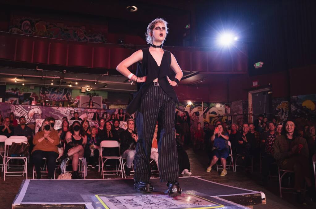 A model in grunge makeup and black clothing walks the runway at the North Bay Fashion Ball in Petaluma on Saturday, May 28, 2022. (North Bay Fashion Ball)