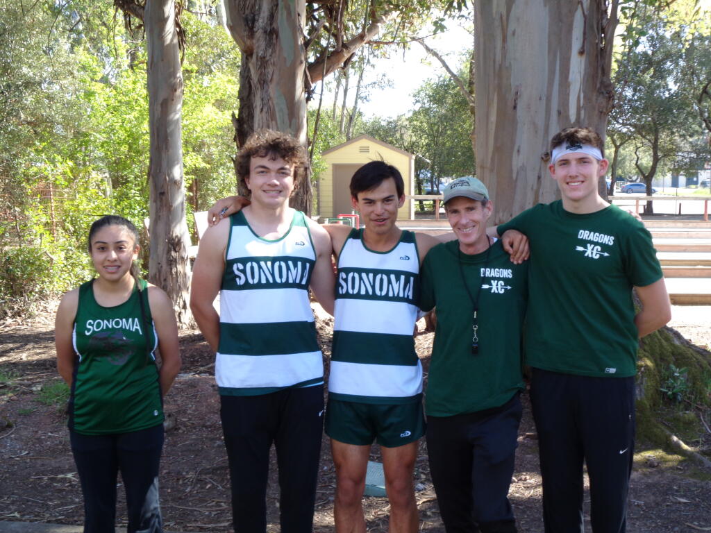 Sonoma Valley cross country runners following 2021 final race at Depot Park include Carmen Carrillo (the only girl who turned out for the sport), Mac Portello, Joseph Silvi,  Coach John Litzenberg and the school’s top runner, senior Ryan Hengehold.