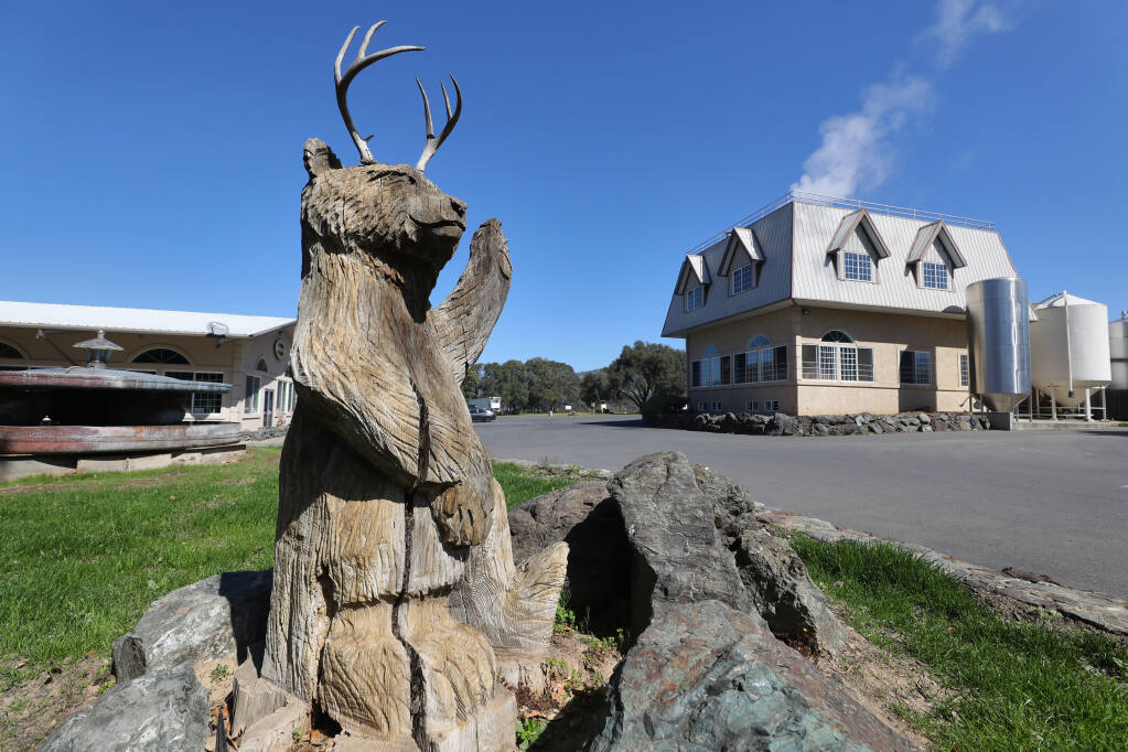 A sculpture of the Anderson Valley Brewing Company mascot greets visitors at the entrance of the production facility in Boonville on Wednesday, March 31, 2021.  (Christopher Chung/ The Press Democrat)